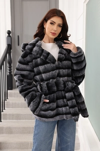 Detail of gray striped faux fur coat with hood and belt waist closure on model