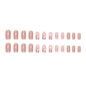 Pink glitter press-on nails set with white hearts and French tips in square-oval shape