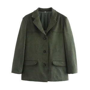 Detailed view of dark green suede blazer with long sleeves, black buttons, and pockets