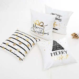 Set of 4 white Christmas throw pillow covers with gold and black Merry Christmas designs