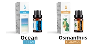 Detail of 10ml Ocean and Osmanthus essential oil bottles with white packaging boxes
