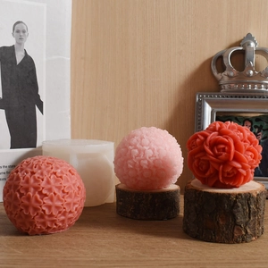 Detailed view of rose flower and clover relief candles with 3D silicone sphere molds