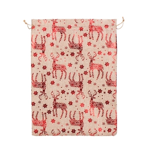Christmas burlap drawstring gift bag with red glitter reindeer and snowflake patterns