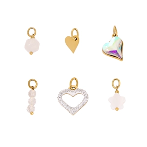 Selection of gold heart and floral charms including rose quartz and crystal details