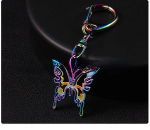 Detailed back view of Y2K colorful butterfly keychain with iridescent oil drip finish