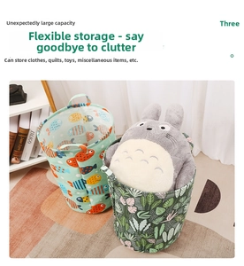 Close-up of large fabric storage baskets with leaf and fish prints with sturdy handles