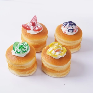 Set of 4 realistic PU foam fruit cakes featuring strawberry and blueberry toppings