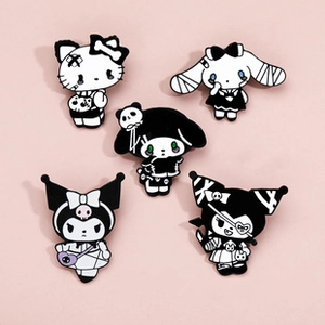 Detailed view of Gothic Sanrio enamel pins featuring Kuromi and My Melody on pink background