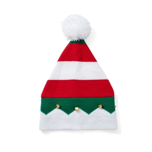 Close-up of festive striped knit elf hat with golden bells and fluffy white pom-pom