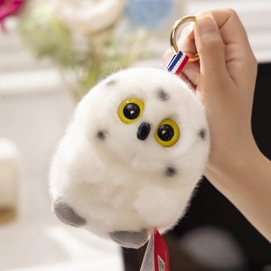 Cute white owl plush keychain with grey spots and big yellow eyes for bag charm