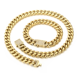 Men's gold Cuban link necklace and bracelet set with iced-out diamond-encrusted flat clasp