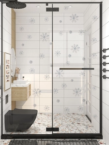 Detail of white snowflake window clings on glass shower door in a modern bathroom decor