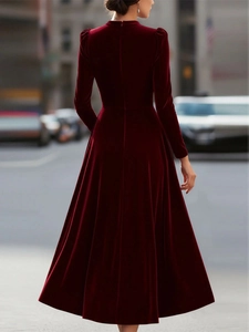 Detailed back view of a dark red velvet long sleeve elegant midi dress for women