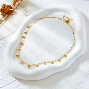 Gold stainless steel evil eye necklace with hollow pendants and clear zircon stones