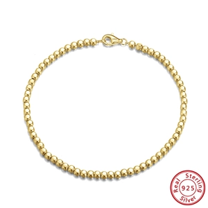 Detailed view of S925 sterling silver golden bead bracelet with secure lobster clasp