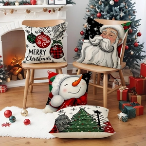 Housses de coussin de Noël en lin avec bonhomme de neige et Père Noël dans un salon