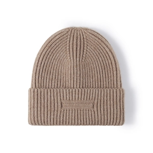 Thick warm jacquard knit beanie in light brown with classic vertical ribbed texture