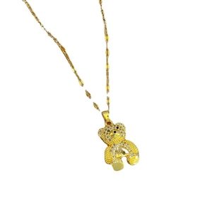 Collier en acier au titane plaqué or avec pendentif ours orné de cristaux étincelants