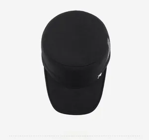 Top view of a black winter cadet hat featuring a minimalist silver metal accent plate
