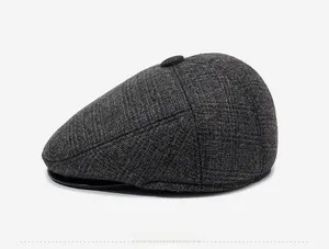Side profile showing the classic streamlined silhouette of grey plaid flat cap