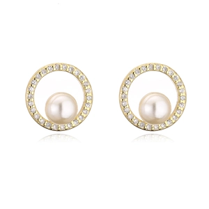 Close-up of gold plated earrings featuring a central pearl and micro-inlaid zircon stones