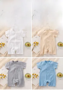 Detail of four-color cotton ribbed baby rompers with front buttons and soft texture