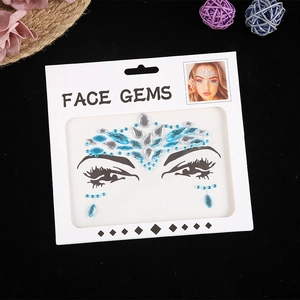 Blue and silver crystal face gems for music festivals with decorative forehead pattern