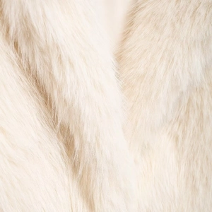 Chic off-white faux fur coat with a soft texture and loose fit for stylish women