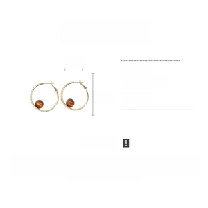 Detail view of 3.5cm gold hoop earrings with brown resin beads, weighing 8.7g