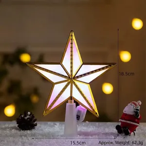 Detail of 18.5cm glowing Christmas tree topper star with warm white lights and golden trim