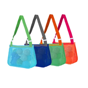 Detail of four colorful mesh beach bags in blue, green and orange with adjustable straps