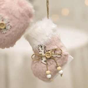 Pink and white plush ice skate Christmas ornament with wooden deer and bead details