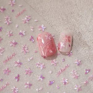 Stereo 3D tulip embossed nail stickers with pink sakura flowers and gold accents on nails