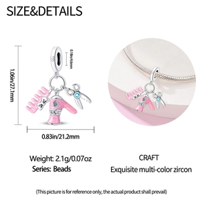 Detail of silver hair stylist charm with pink enamel dryer and blue zircon scissors
