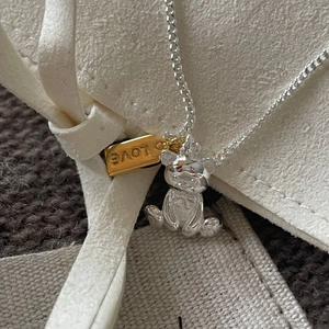 925 Sterling silver bear pendant necklace with golden LOVE charm on soft textile