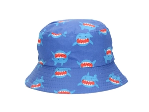 Close-up of blue baby sun hat featuring cute cartoon shark prints and breathable cotton fabric