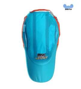 Detail of breathable mesh lining and 52-54cm size label on children's blue sun hat