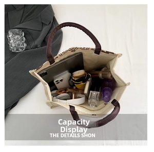 Spacious linen tote bag interior showing capacity for tablets and cosmetics