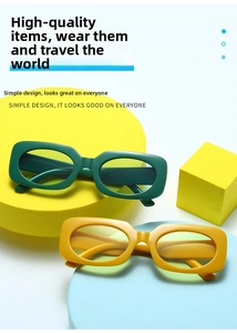 Macro shot of two vintage rectangular sunglasses in dark green and bright yellow