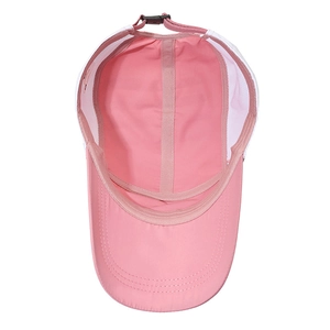 Pink quick-dry baseball cap with white mesh panels and adjustable plastic back buckle