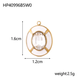 Detail showing an oval gold-plated pendant with white inlay and zircon stone, 1.6cm x 1.2cm