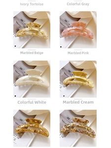 Detailed set of six acetate hair claws featuring marble and tortoiseshell patterns