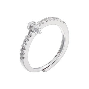 Detailed macro view of silver-plated adjustable ring with cubic zirconia stones