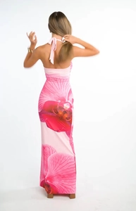 Close-up of pink orchid floral pattern and backless design on a long halter neck dress