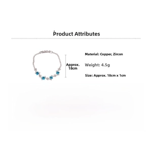 Macro detail of oval silver bracelet with blue zircon inlay showing 18cm length and 4.5g weight