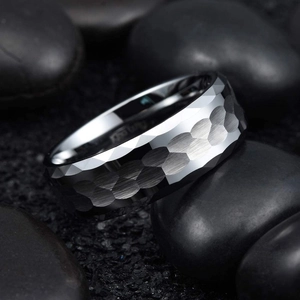 Mens silver tungsten carbide ring featuring a unique hammered honeycomb surface on pebbles
