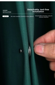 Macro detail of silver magnetic curtain closure buckle being installed on fabric