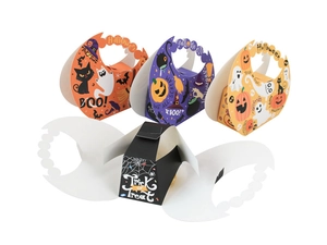 Flat lay and assembled Halloween paper gift boxes with pumpkin cutout handles and patterns