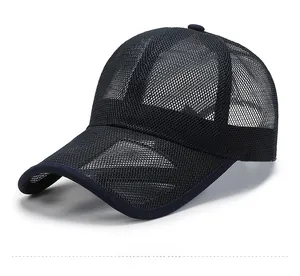 Side view detail of breathable full mesh baseball cap with curved brim in dark blue