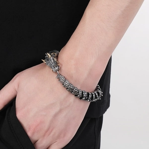 Punk style dragon bracelet in stainless steel with golden horns and green eyes for men